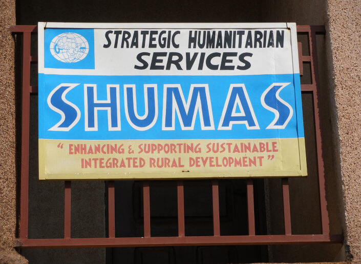 Shumas Sign - Strategic Humanitarian Services